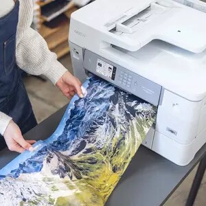 Compact and multifunction, large format printer. Designed for businesses needing a flexible printer that can print, scan, 
